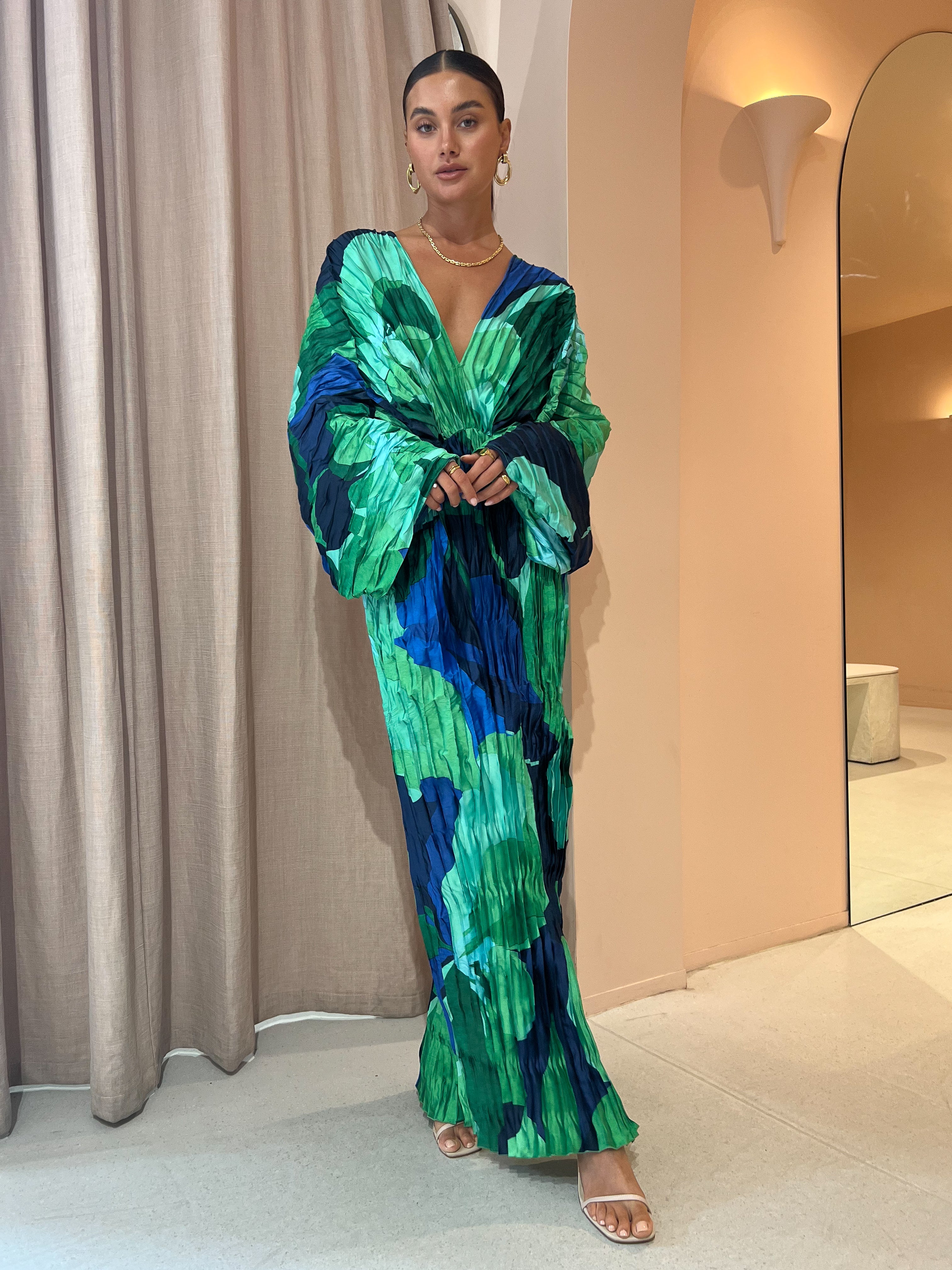 green emerald velvet dress L'idée De Luxe Gown in Capri Green - Hire Now main image 0
