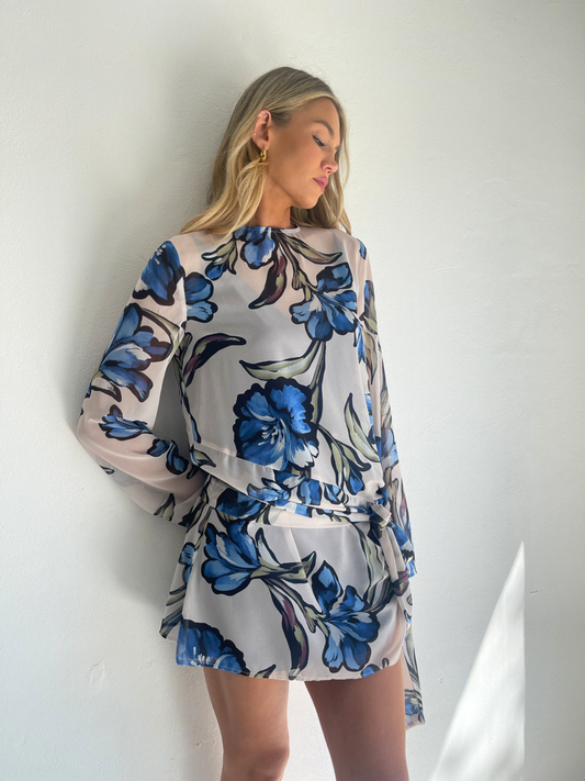 BY NICOLA Elodie Mini Dress in Blue Floral with feminine floral print and mini silhouette