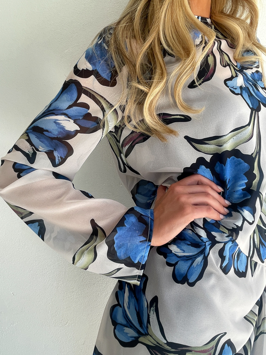 BY NICOLA Elodie Mini Dress in Blue Floral with feminine floral print and mini silhouette
