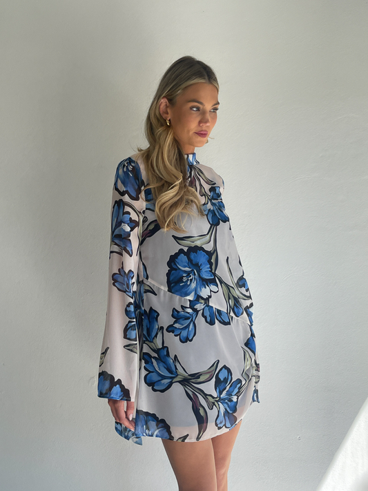 BY NICOLA Elodie Mini Dress in Blue Floral with feminine floral print and mini silhouette