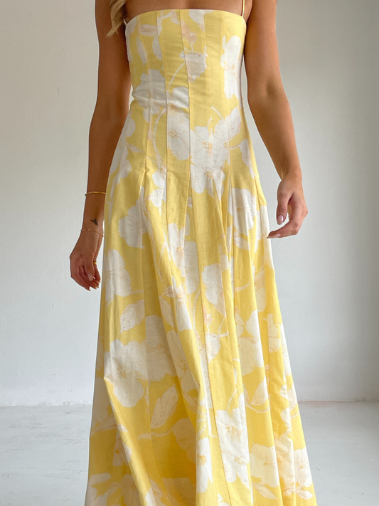 By Nicola Camille maxi dress in amarilla flor floral yellow print with delicate straps, perfect for weddings, summer events and garden parties