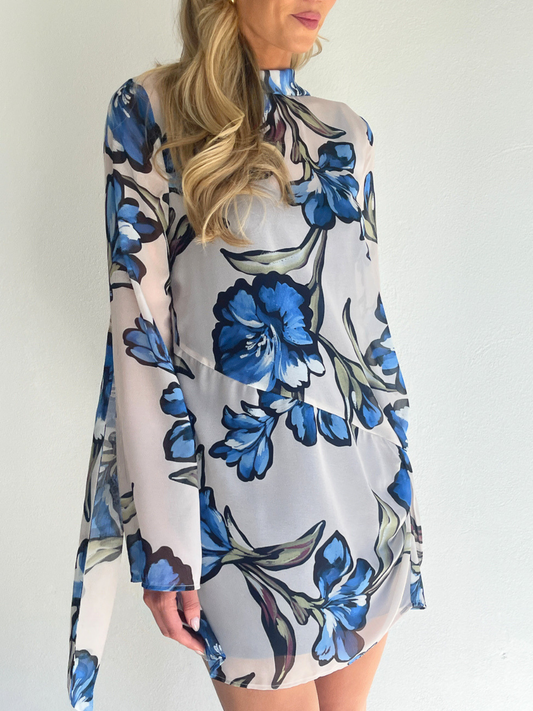 BY NICOLA Elodie Mini Dress in Blue Floral with feminine floral print and mini silhouette