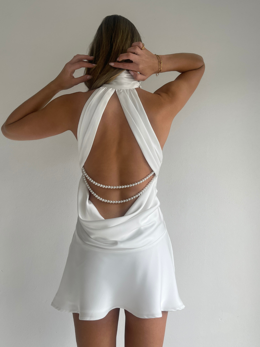 "Arley Amaya mini dress in ivory, backless with pearl detail”