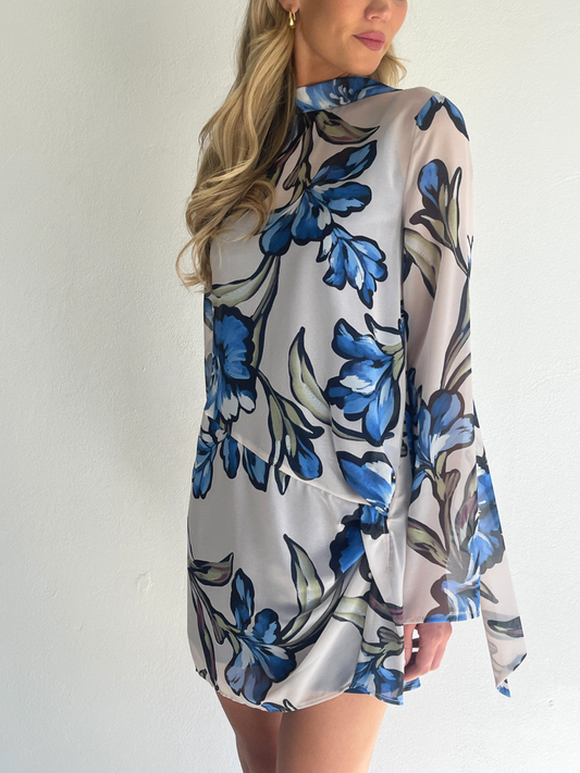 BY NICOLA Elodie Mini Dress in Blue Floral with feminine floral print and mini silhouette
