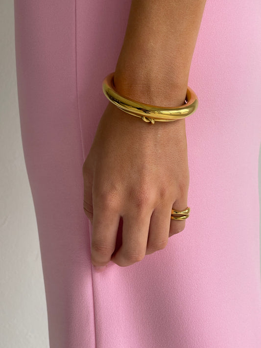 By Nicola Chloe Cuff in Gold